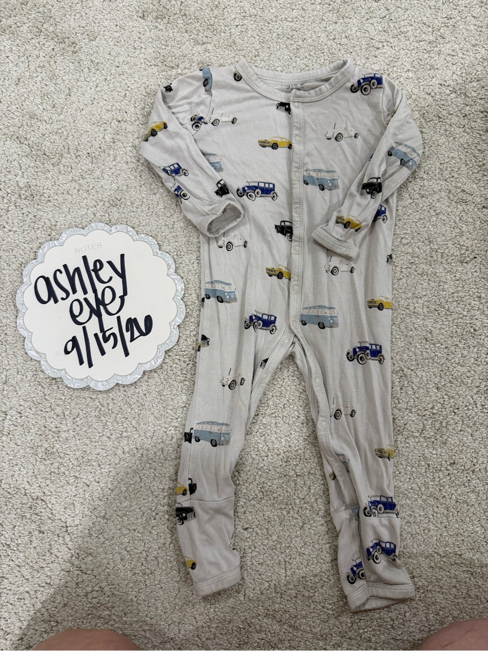 Kyte BABY Neutral Car-Print One-Piece with Blue and Yellow Accents